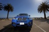 Driving 2013 BMW X5 M in Monte Carlo Blue Metallic from a frontal view